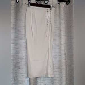 Midi skirt with lace up hip detail.